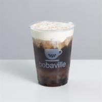 Roasted Oolong Salted Crema · Sweetened roasted oolong tea topped with crema sprinkled with milled himilayan salt.
