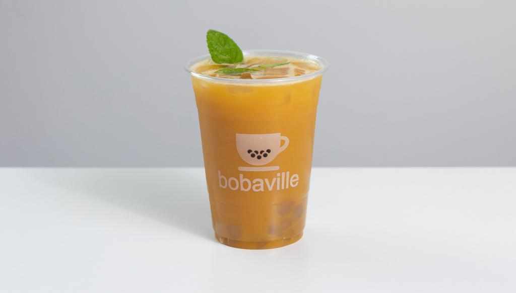 Mango Summer Tea · A tart drink made to quench any thirst, this lemonade-like drink is made with mango puree, jasmine green tea, lemon juice sugar, and mint.
