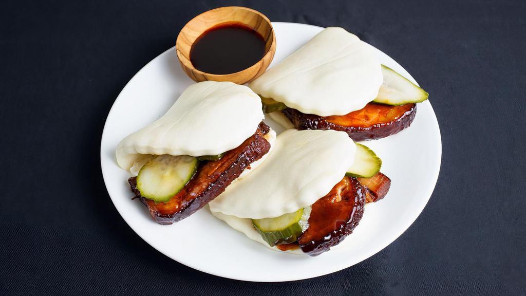 Pork Belly Baos by China Live Signatures · By China Live Signatures. 3 pieces. Chef Chen's 8-spice braised pork belly 'Gua Bao', with sliced pickled cucumber in soft steamed lotus bun. Contains gluten, sesame, dairy, and soy. We cannot make substitutions.
