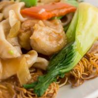 Crispy Pan Fried Noodles - Hong Kong Style · Combination vegetables combined with selected meat served on top of crispy noodles. Your cho...