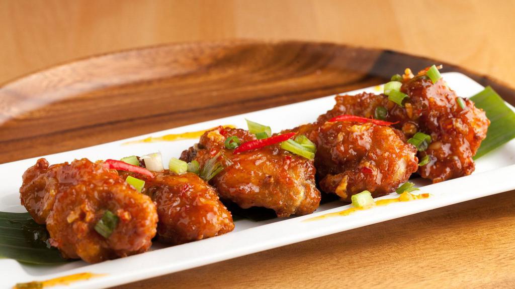 Spicy Chicken Wings · Spicy hot chicken wings that will make your mouth water. Served with a side of ranch dressing.