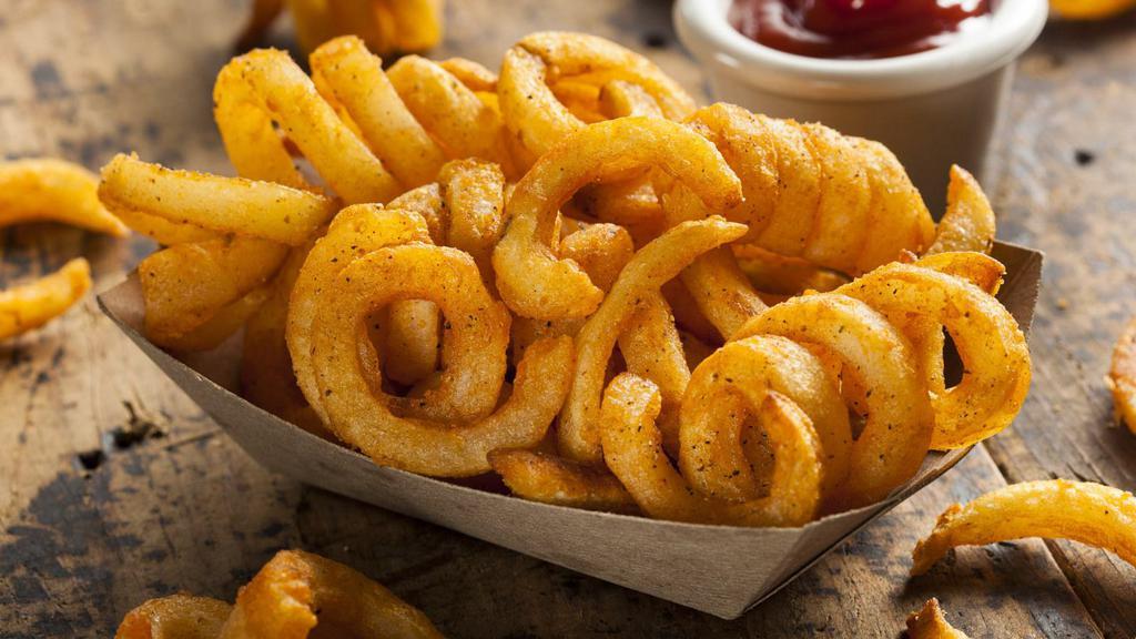 Curly Fries · Curly, golden hand-cut potatoes.