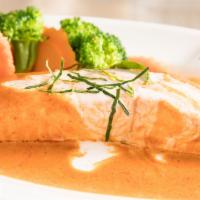 Choo Chee Salmon · Spicy. Gluten-Free. salmon simmered in red curry sauce and kaffir lime leaves