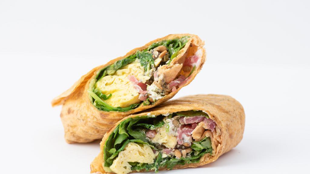 Morning Glory Wrap · Tomato Basil Tortilla, Scrambled Eggs, Avocado, Super Greens Blend, Roasted Potato, Pickled Red Onions, Goat Cheese, Basil Pesto, Superseed Crunch