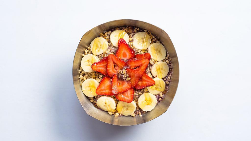 Breakfast Bowl™ · 370 cal. Base blend- organic acai, almond milk, apple juice, bananas, strawberries, flax seed. Toppings- organic granola, bananas, strawberries, honey.