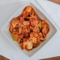 Chili Chicken · Chicken cooked with tomatoes, green chili & spices.