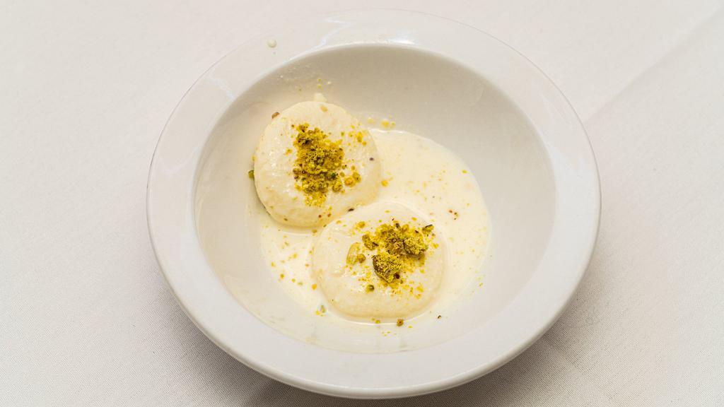 Ras Malai · Flattened balls of cottage cheese in sweetened thick condensed milk