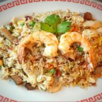 F9. Combination Fried Rice · Fried rice with chicken, BBQ pork, shrimp, egg, pea & carrot and onion.