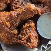 Violet's Fried Chicken (6-Pieces) · 6 Pieces of Mary's Free Range Chicken:
Cornmeal Battered  Legs, Thighs & Wings, Housemade Ra...