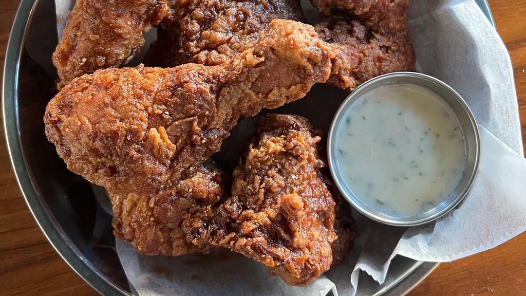 Violet's Fried Chicken (6-Pieces) · 6 Pieces of Mary's Free Range Chicken:
Cornmeal Battered  Legs, Thighs & Wings, Housemade Ranch