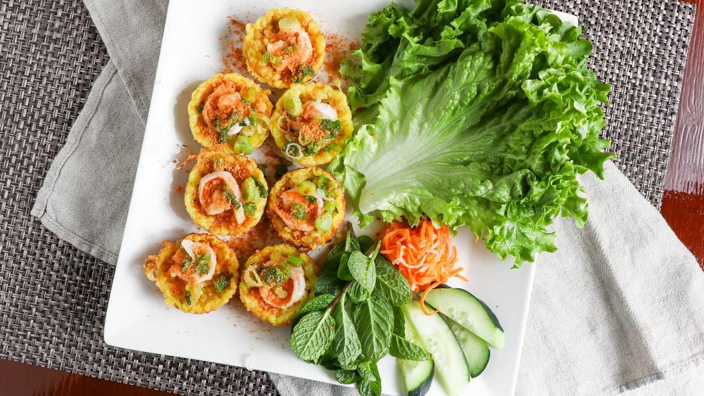 15.(Shrimp Mini Pancake) Banh Khot Tom · Sweet onion, bean sprout in pan seared rice flour with lettuce, mints, cucumber and house fish sauce.