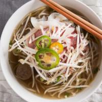 1 (Combo Beef Pho) Pho Dac Biet · Beef, tripe, tendon, briskets, &beef balls with rice noddle