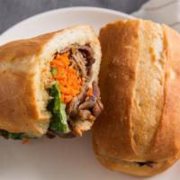 39. (BBQ pork sandwich) Banh Mi Thit · BBQ pork with carrot,cucumber, cilantro and jalapeno.