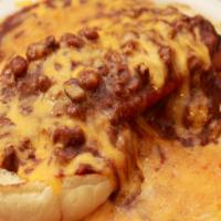 Chili Cheese Dog · A 1/4 lb. hot dog in an open-faced burger topped with eight oz of chili con carne - contains...