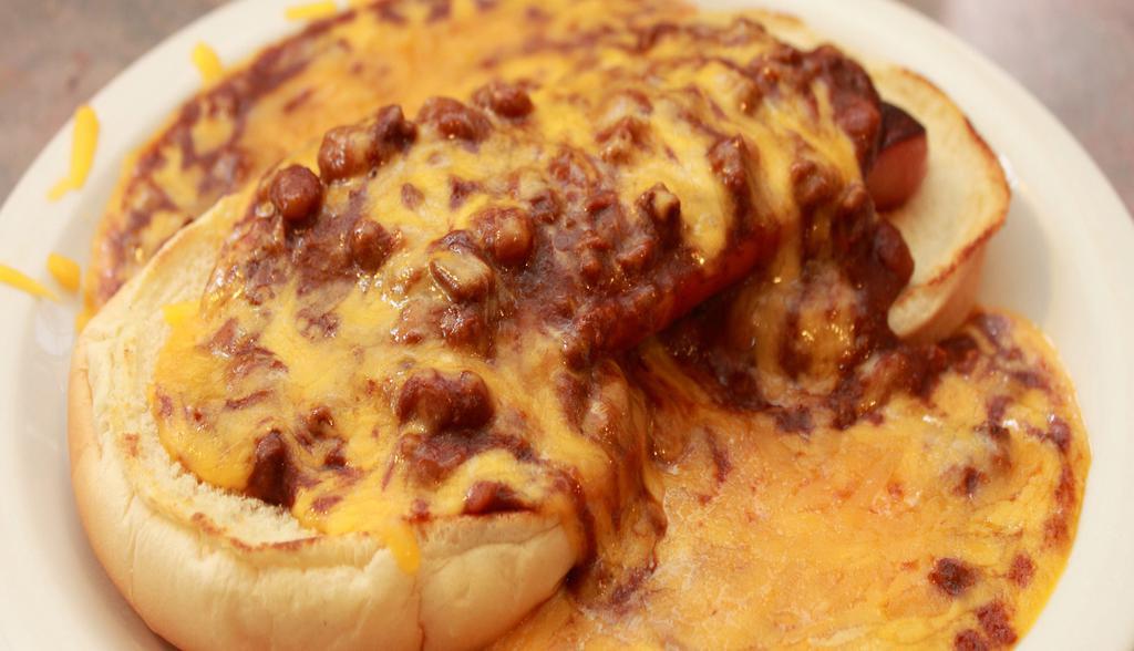 Chili Cheese Dog · A 1/4 lb. hot dog in an open-faced burger topped with eight oz of chili con carne - contains beans, cheddar cheese choice of grilled or raw onions.