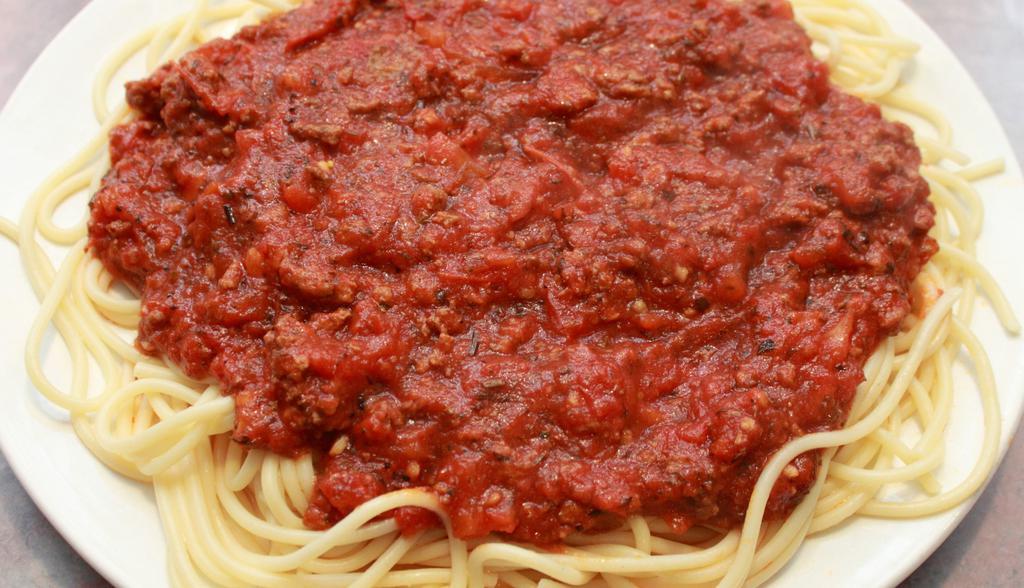 Spaghetti & Meatballs · Pasta noodles topped with our famous tomato meat sauce and two beef and pork meatballs.