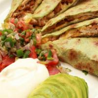 Grilled Chicken Quesadillas · Rilled chicken breast, choice of flour or spinach tortilla filled with jack and cheddar chee...