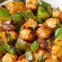 Chilli Paneer · Deep-fried paneer cooked with onion sauce and special aromatic spices.