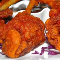 Chicken Lollipop · Chicken drumetts marinated in an egg and yogurt spiced mix, deep-fried, and served with mint...