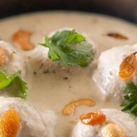 Malai Kofta · Mashed vegetable balls immersed in creamy gravy and cooked to a thick consistency.