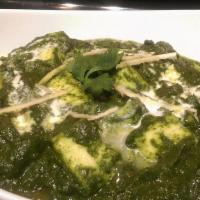 Palak Paneer · This dish is very smooth creamy palak paneer made with fresh spinach leaves, paneer, onions,...