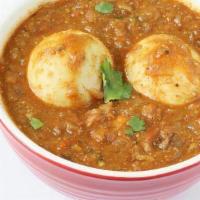 Egg Masala · Whole Boiled Eggs lightly tossed and fried with onions and green chillies in hint of herbs a...