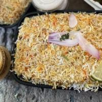 Chicken Dum Biryani · Aromatic basmati Rice and succulent chicken cooked in a blend of herbs.