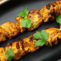 Chicken Tikka Kabab · Chicken breast chunks are marinated overnight and cooked in the tandoor.