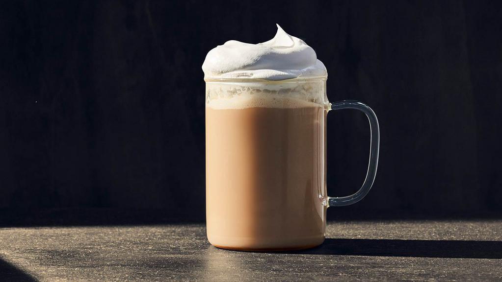 Madagascar Vanilla Latte · Regular (260 Cal.), Large (310 Cal.) Freshly brewed espresso with foamed milk and Madagascar vanilla syrup, topped with whipped cream. Allergens: Contains Milk