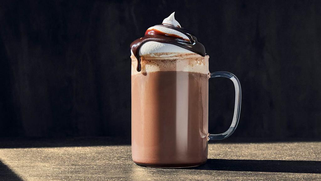 Chocolate Latte · Regular (370 Cal.), Large (420 Cal.) Freshly brewed espresso, foamed milk and chocolate topped with whipped cream and a drizzle of chocolate syrup. Allergens: Contains Milk
