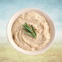 Hummus Appetizer Huba Huba · Parboiled chickpeas, mashed, blended, and mixed with generous amounts of minced garlic, tahi...