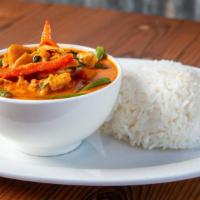 Pumpkin Curry** · Medium Spicy. Pumpkin, green beans, bell peppers simmered in red curry.
