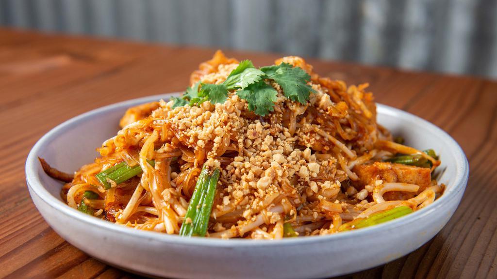 Pad Thai · Thin rice noodles, egg, bean sprouts, green onions, red onions, peanuts.