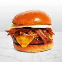The Bacon Cheeseburger · Beef patty with bacon, lettuce, tomato, onion, pickles, spicy mayo, and melted cheddar chees...