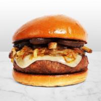 The Mushroom Lover Burger · Beef patty with roasted mushrooms, caramelized onions, melted swiss cheese, and spicy mayo o...