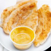 Roti with Curry · Spicy. Indian bread with Thai curry.