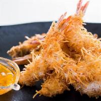 Fried Coconut Shrimp · Coconut battered shrimp, deep fried and served with a spicy sweet sauce.