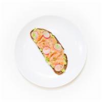 Smoked Salmon Avocado Toast · Smashed avocado on whole wheat toast and topped with smoked salmon, olive oil, sliced radish...