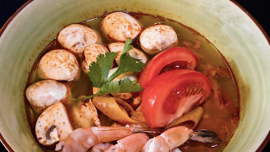 Tom Yum Soup · Hot and sour soup with mushrooms, tomatoes, lemongrass, galanga-from the ginger family and lime juice. Choice of protein.