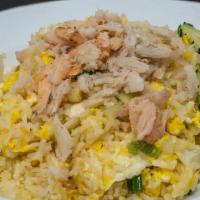 39. Crab Meat Fried Rice · Fried rice with crabmeat, egg, and onions, topped with cilantro and cucumber.