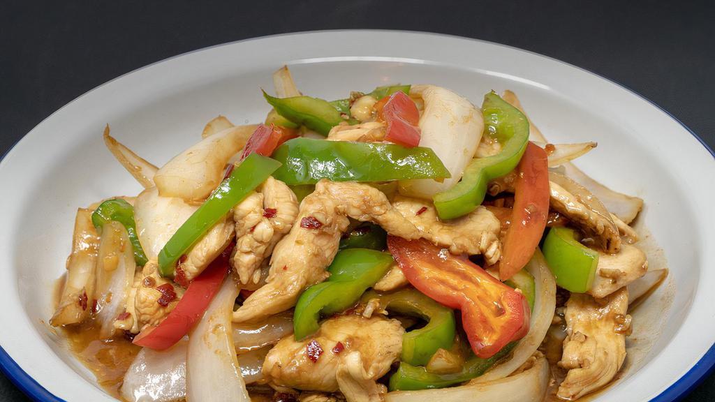 21. Pad Prik Sod · Choice of meat-chicken, beef, or pork. Sautéed with bell peppers, onions and Thai chili.
