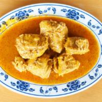 Chicken Curry · Chicken cooked in a blend of spices.