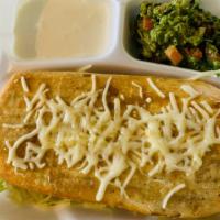 Chimichanga · Deep fried burrito with your choice of meat, rice, beans, cheese, and side of sour cream and...