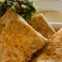 Super quesadilla  · Flour tortilla with cheese, your choice of meat and a side of sour cream and avocado slices....