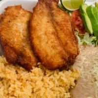 BeerBattered Fish Plate · Tilapia fish fillete marinated in beerbatter and deep fried with a side of rice, beans, smal...