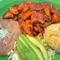 Camarones a la Diabla · Shrimp sautéed in a spicy sauce served with rice, beans, and salad with corn or flour tortil...