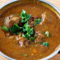 Lamb Curry · Lamb cooked with onion and tomato gravy.