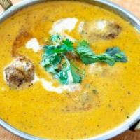 Lamb Korma · Lamb cooked with exotic creamy curry.