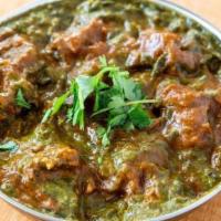 Lamb Saag · Lamb cooked with spinach and spices.