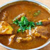 Chicken Curry · Chicken cooked in onion based gravy with an Italian spices.